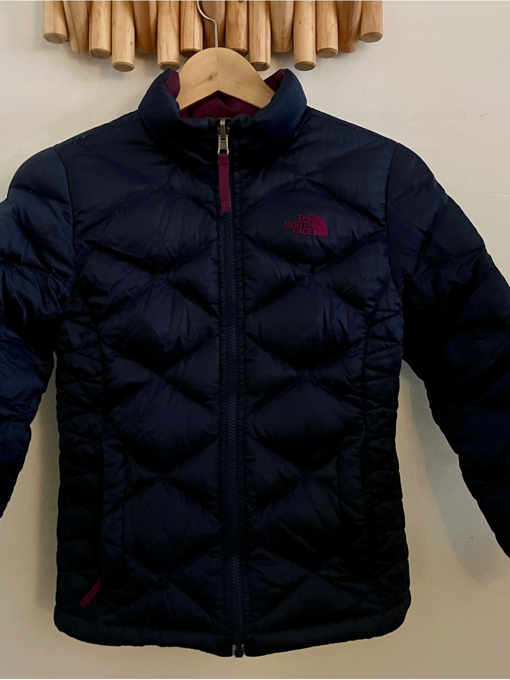 The North Face Girls Navy Puffer Jacket with Pink Accents
